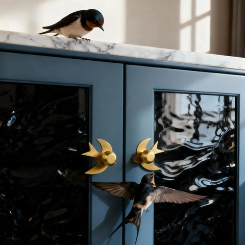Blue cabinet with Solid Brass Gold Cabinet Knobs 4 Pack With Swallow Backplates, modern dresser handles, brushed brass finish.