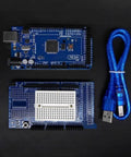 Ultimate STEM Electronics Starter Kit with Mega 2560 board, blue USB cable, and proto shield on black background
