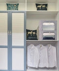 Closet with Three Pack Grab And Go Clothes Storage Bins Set with Stackable Foldable Organizer Boxes, clear window view, gray.