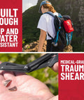 Person hiking with 98 Piece Premium First Aid Kit For Travel on backpack; close-up of medical-grade trauma shears in hand.
