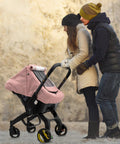 Parents strolling with stroller featuring All Season Waterproof Baby Car Seat Cover With 3D Mink Dot Interior Dual Breathable Vents
