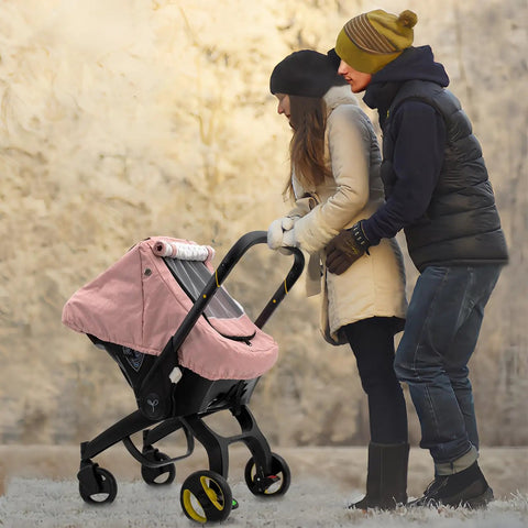 Parents strolling with stroller featuring All Season Waterproof Baby Car Seat Cover With 3D Mink Dot Interior Dual Breathable Vents