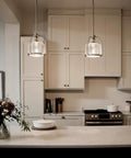 Modern kitchen with One Light Mini Pendant In Brushed Nickel, cool steel fixture over island, requires 75W A19 bulb, dry location.