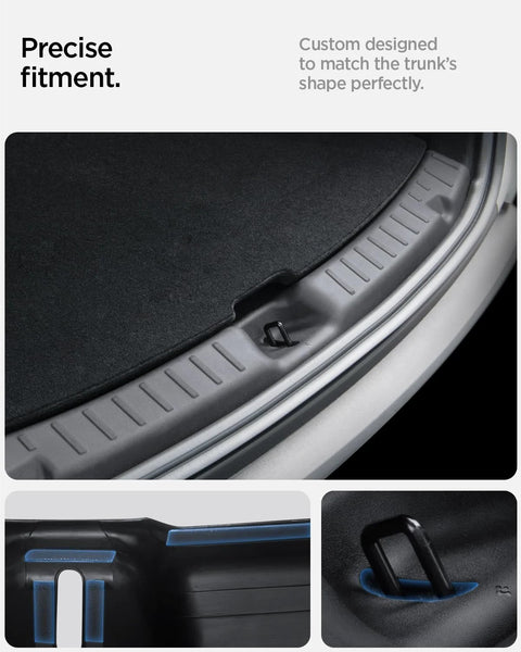 Spigen rear bumper trunk sill guard installed on Tesla Model Y 2025–2026, black with easy glide grooves
