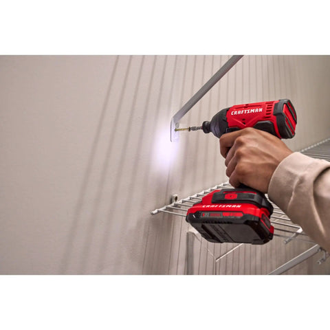 Using Cordless Quarter Inch Impact Driver Kit With 2Ah Lithium Battery to fasten a bracket, LED light on, high torque, in action