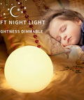 LED Glowing Ball Light Cordless 8 Inch With 16 Color Changing Options And 4 Light Modes Fade Smooth Flash Strobe Rechargeable Dimmable Mood Lamp With Remote Control For Home Patio Yard Decor And Kids Night Light Chill Vibe in a bedroom setting with a dim light glow.