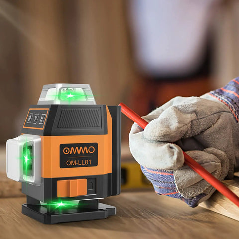 Green Laser Level Self Leveling Kit With 16 Laser Lines, 4x360 Degree Coverage on a workbench beside gloved hand.