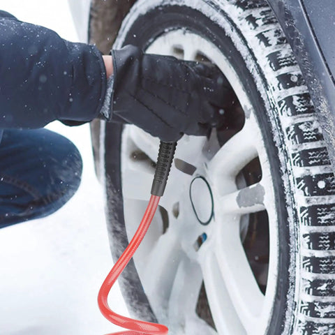 1/4 Inch Polyurethane Recoil Air Hose 10 Ft Self Coiling Compressor Hose With Fittings being used in snowy conditions
