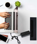 1 Pack Rectangle Hole Cover Square Cable Grommet 268x68x28mm for Desk Cable Management, black aluminum next to a laptop