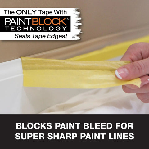 Hand using Delicate Surface Painters Tape With PaintBlock Technology For Sharp Lines No Bleed Low Adhesion To Protect Freshly Painted Walls And Trim Yellow One Point Five Inch Wide By Sixty Yard Roll on edge.