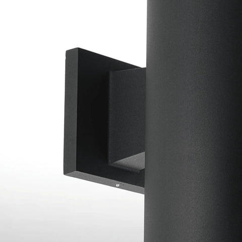Close-up of 5 Inch Cylinder Outdoor LED Wall Sconce With 2 Lights Up And Down, Slick Aluminum Black Wall Mount Lighting for indoor or exterior use.