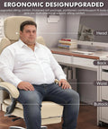 Man sitting on 500lbs Capacity Big And Tall Office Chair With Lumbar Support PU Leather Heavy Duty Reclining Chair in beige