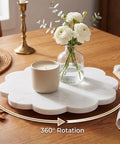 10 Inch Scalloped Marble Lazy Susan Hella Smooth Spinning Kitchen Turntable For Spices Oils And Condiments on wooden table with candle and flowers.