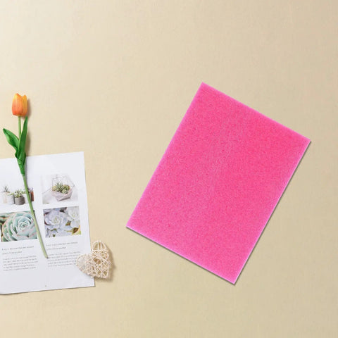 Pink sheet from Pearl Cotton Foam Sheets Two Pack, Lightweight Tear Resistant Packing Inserts shown on beige surface