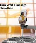 Universal In Flight Phone Holder Mount on suitcase handle for hands-free viewing at airport, 360 degree rotation visible.