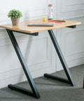 Rock Solid Heavy Duty Metal Table Legs With Adjustable Feet Industrial Z Shape Frame For Custom Dining Desks Coffee Tables And Patio Projects Bang For Your Buck Super Easy Install applied to a light wood desk with a black Z shape frame.