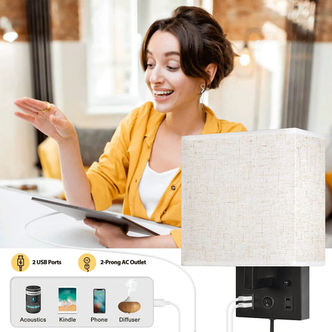Woman using a tablet next to a Bedside Wall Lamp Set Of 2 Plug In Sconce Lights with USB Charging Ports and AC Outlet Brushed Nickel.
