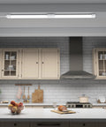 Linkable Two-Foot LED Shop Light Two Pack 5000K 18W Plug In Ceiling Closet Laundry Kitchen Garage Workbench Under Cabinet Triproof White Ultra Bright Energy Saving Lighting Fixture installed in a modern kitchen above counter.
