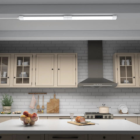 Linkable Two-Foot LED Shop Light Two Pack 5000K 18W Plug In Ceiling Closet Laundry Kitchen Garage Workbench Under Cabinet Triproof White Ultra Bright Energy Saving Lighting Fixture installed in a modern kitchen above counter.
