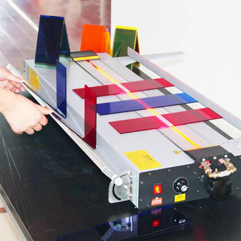 Rock Solid Electric Plastic Hot Bender And Acrylic Bending Press With Adjustable Heat Settings and Fast Chill Water Cooling, showing setup and colorful acrylic sheets.