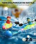 Dual RC Kayaks For Kids 6-12 With Magnetic Dolphin Nose And Three Balls, Two Independent 2.4GHz Remotes, Up To 40 Minutes Playtime, LED Light Up Water Toys For Pool, Bath, And Water Table, Great Sibling Race Fun in vibrant colors racing in water with splash effect and blue balls.