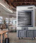 Portable Evaporative Air Cooler With Large Water Tank And 120 Degree Oscillation For Patios Or Dry Rooms in a modern indoor setting.
