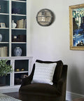 Farmhouse Wood Wall Sconce With Industrial Cage, 1 Light, Rustic Back Plate, Weathered Finish in a cozy living room