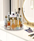 Two Pack 11 Inch Lazy Susan Organizer With Non Slip Turntable holding skincare and makeup items on vanity