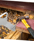 Heavy Duty Furniture Lifter That Makes Moving Day A Complete Piece Of Cake Without Making You Break A Sweat For Easily Hoisting Doors Windows And Drywall Panels With Non Slip Traction, alongside a hammer on wood.