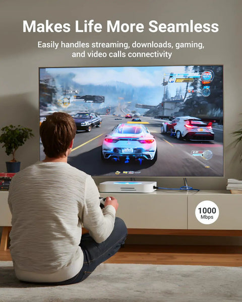 Person gaming on a TV showcasing internet speed benefits of Cat6 RJ45 Pass Through Connectors Kit With Storage Can, 1000 Mbps.