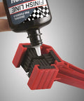 Applying lubricant on Grunge Brush Bike Chain And Gear Cleaner With Dual Sided Bristles for chains and cassettes cleaning