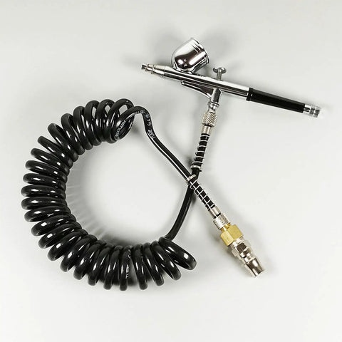 Heavy Duty Air Compressor Hose With 1 4 Inch Quick Release Couplers No Kink Nonsense Tubing coiled with airbrush for easy use.