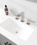 Top Shelf 96 Inch Gray Double Sink Bathroom Vanity With Durable Carrara Quartz Top And Undermount Porcelain Sinks Plus Flawless Brushed Nickel Hardware For Rapid Home Renovations showing undermount sink and brushed nickel faucet.