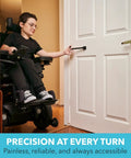 Person using accessible TPull door closer with easy grip swiveling handle on interior door, promoting pain-free operation.