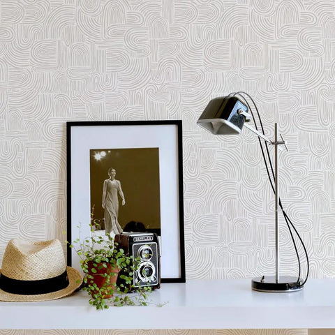 Room with Sand Swirl Swell Removable Peel And Stick Wallpaper With Retro Curves, 20.5 In Wide By 16.5 Ft Long, behind décor.