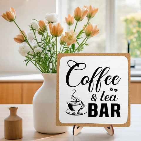 Rustic Coffee And Tea Bar Decor Sign Dope Wooden Plaque For Cafe Bar Or Coffee Station Or Shelf Farmhouse Kitchen Vibe And Tea Accessories For Home Or Office 5.9 By 5.9 Inches White And Brown displayed on a table with flowers in the background.