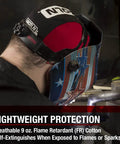 Man wearing Flame Resistant Welding Beanie FR For Welders Black And Red XL Knit Hat With Flame Retardant Fabric K2994 during hot work