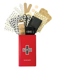 Front view of Patch eco first-aid kit in a red tin with white cross logo, containing assorted bandages and supplies