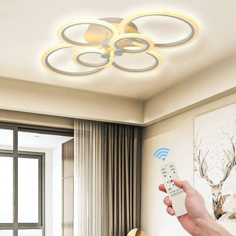 Dope Modern LED Ceiling Light Fixture With 6 Adjustable Ring Design, Flush Mount, in a living room with remote control visible.