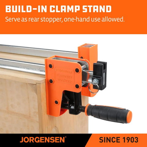 Close-up of 48-Inch Heavy Duty Bar Clamps Set With Parallel Jaws, highlighting reversible head on wood panel, orange and black design.