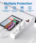 Heavy Duty Surge Protector Power Strip With 6 Outlet Slots And 6 Feet Extension Cord Delivering 600 Joules Protection on table with devices.