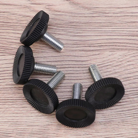 Badass Heavy Duty Adjustable Furniture Levelers With Tee Nuts Kits Black Steel And Rubber Pads For Killing Wobble On Cabinets Tables Chairs Workbenches Quick Setup close-up of black rubber pads with threaded steel screws.