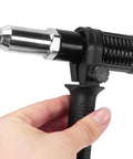Heavy Duty Pop Rivet Gun Adapter Kit For Cordless Electric Drills With Beefy Aluminum Build And Four Quick Swap Sizes Super Slick Universal Fit For Shop Floors, close-up of handle and nozzle.