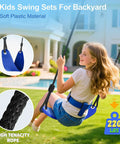 Child using the 3 In 1 Outdoor Swing Set With Saucer Swing Belt Seat And 4 Ft Trampoline Heavy Duty A Frame Metal Stand With Safety Stakes 440 Lb Capacity Backyard Playground For Toddlers 3 To 8 Years Old in a backyard setting.
