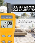 Yellow Must Have Handheld CO2 Meter With Alarm 0 To 9999ppm Carbon Dioxide Detector Temperature And Humidity Readouts NDIR Sensor Air Quality Monitor in outdoor setting
