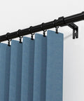 Ultra Long Curtain Rod 30 To 240 Inches Heavy Duty 1 Inch Black Drapery Rod Set With Modern End Caps in use with blue drapes