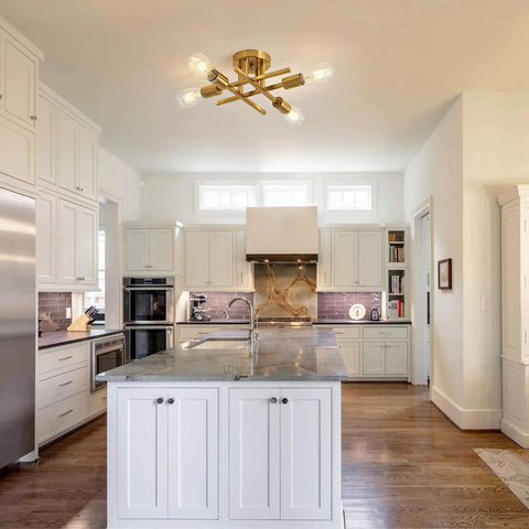 Modern Golden Metal Semi Flush Mount Ceiling Light Fixture Four Light Sputnik Style Chandelier in kitchen setting.