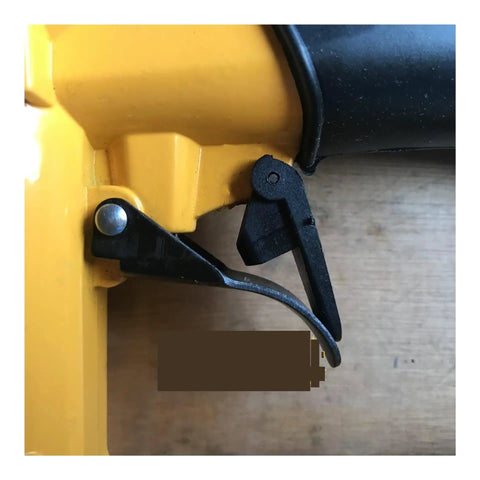 Close-up of trigger mechanism on Professional Pneumatic Nail Gun Compatible With 7116 Staples And Air Compressor for upholstery.