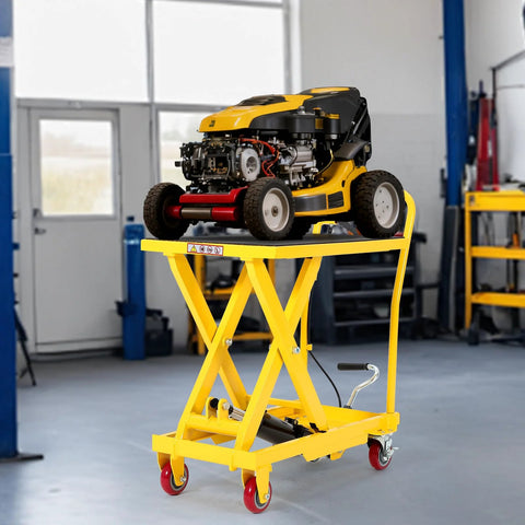 GarveeTech hydraulic lift table cart, yellow scissor-lift on wheels, carrying a lawn mower.