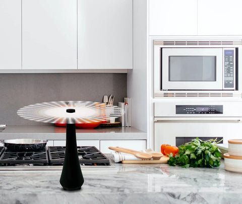 Three Pack Battery Operated Tabletop Fly Fans For Indoor Or Outdoor Use No Fuss Easy Setup in a modern kitchen setting